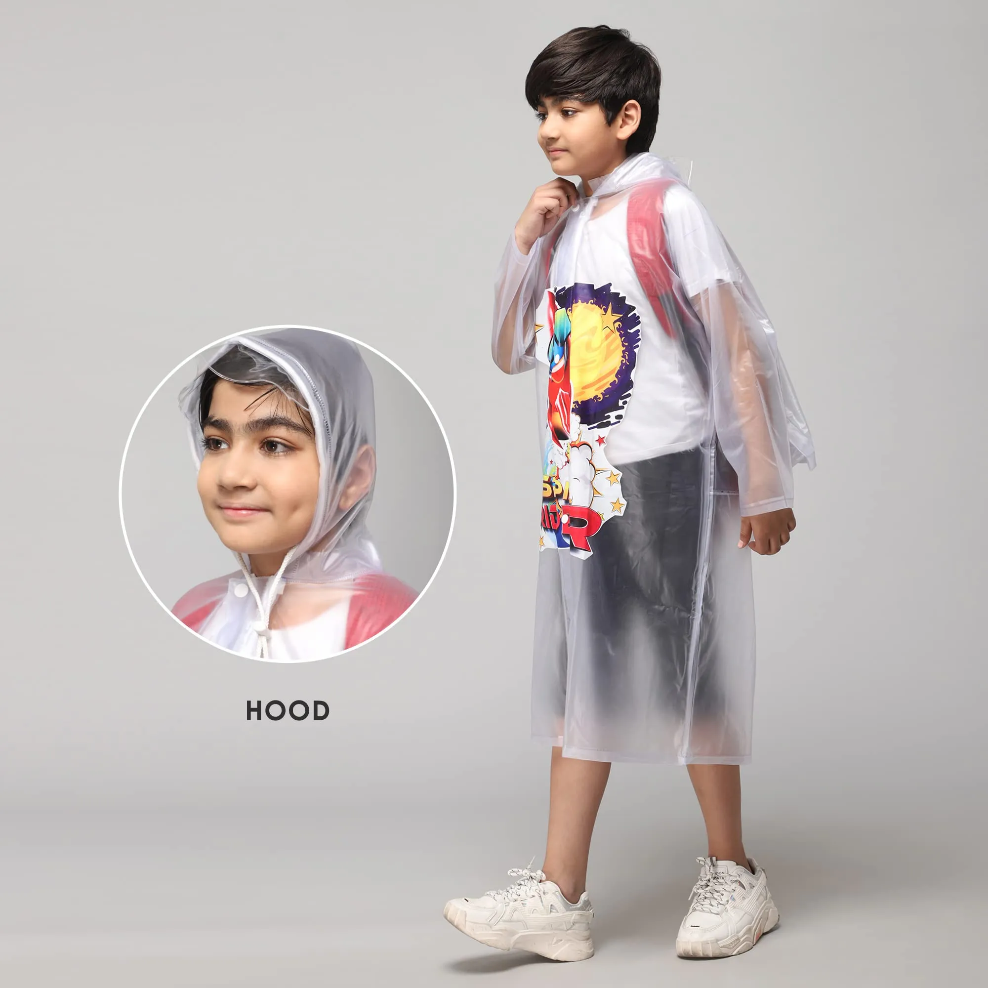 THE CLOWNFISH Toon Caper Series Kids Waterproof PVC Longcoat with Adjustable Hood & Extra Space for Backpack/Schoolbag Holding. Printed Plastic Pouch. Kid Age-3-4 years (Link White-Transparent)