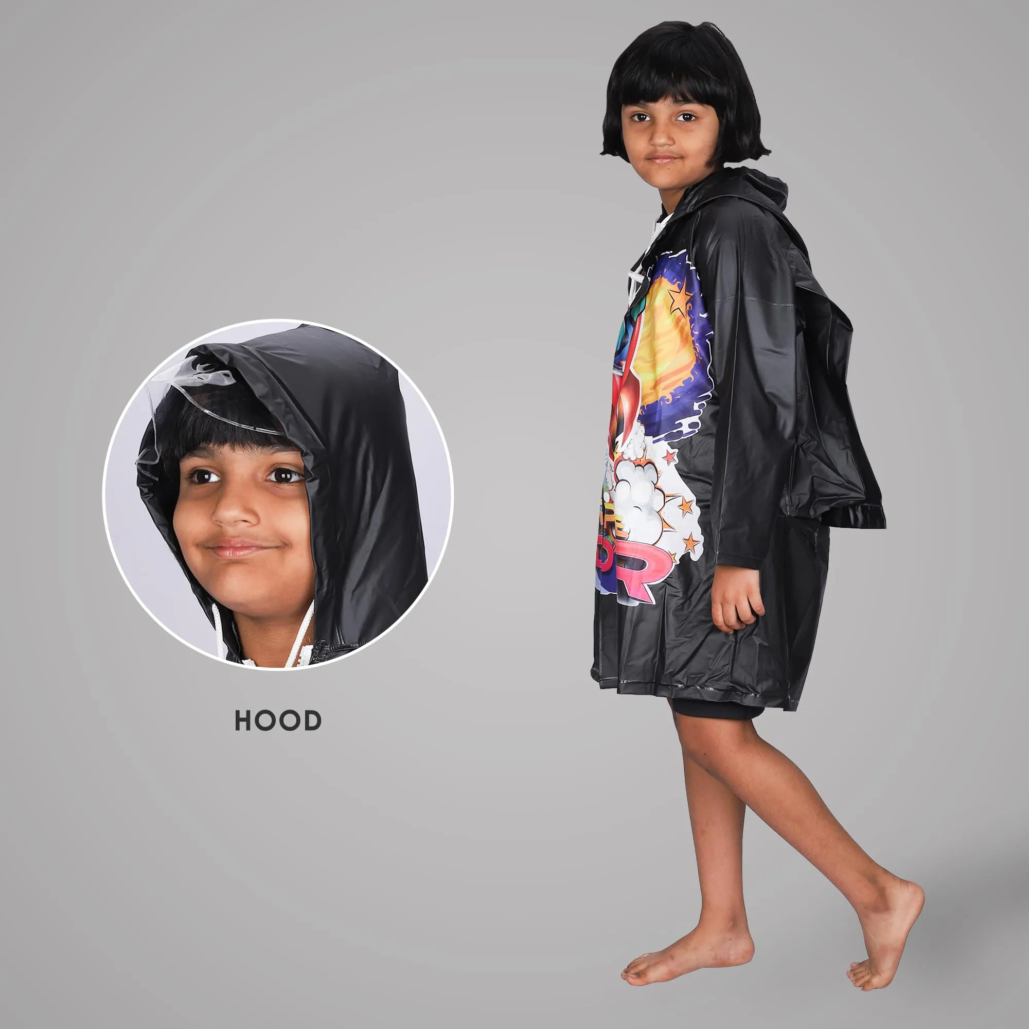 THE CLOWNFISH Toon Caper Series Kids Waterproof PVC Longcoat with Adjustable Hood & Extra Space for Backpack/Schoolbag Holding. Printed Plastic Pouch. Kid Age-4-5 years (Black)